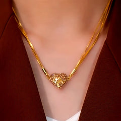 Close-up of the pendant and clasp on the Magnetic Heart Necklace