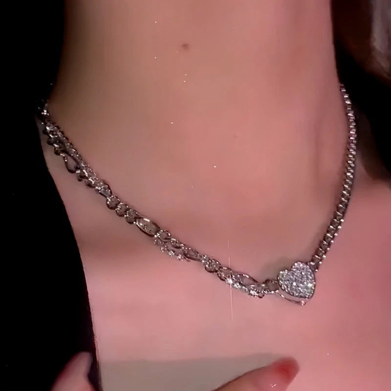 Close-up of the pendant and clasp on the Magnetic Heart Necklace