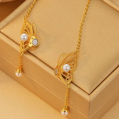 14K Gold-Plated Magnetic Pearl Hollow Butterfly Necklace worn to showcase its length and pendant detail