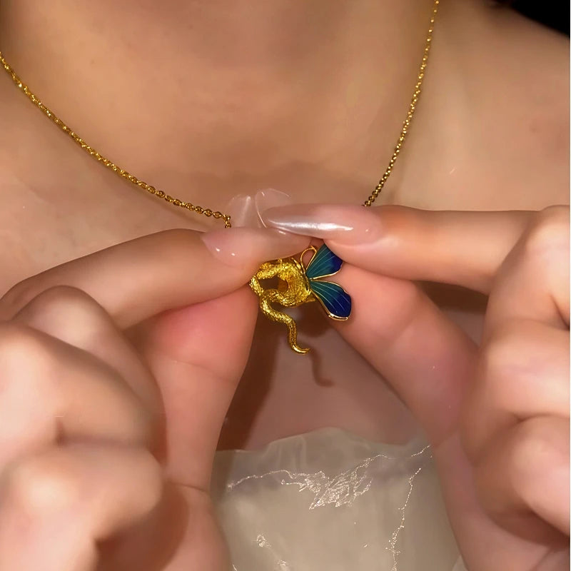 Detailed view of the 14K Gold-Plated Magnetic Snake Catch Butterfly Necklace chain and pendant