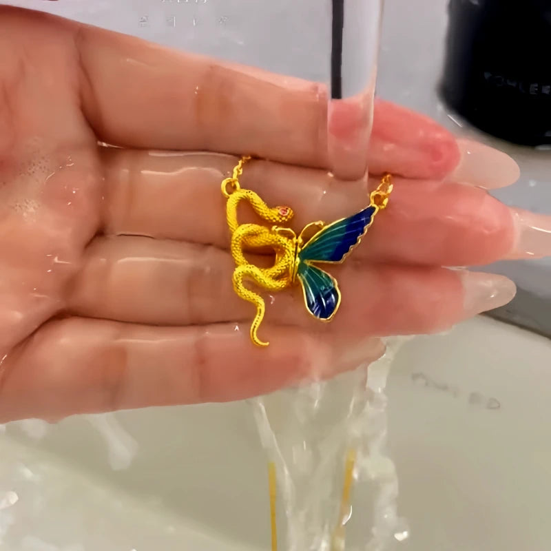 Close-up of the pendant and clasp on the Snake Butterfly Necklace