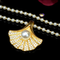 14K Gold-Plated Maple Leaf Pearl Pendant Necklace worn to showcase its length and pendant detail