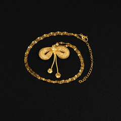 14K Gold-Plated Mesh Butterfly Bow Pendant Necklace worn to showcase its length and pendant detail