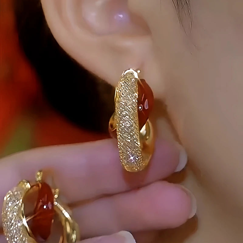 Close-up detail of the sparkling zircons and plating on the Mesh Crystal Earrings