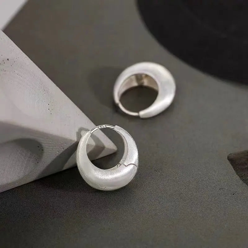 Matte Brushed Silver Chunky Thick Hoop Earrings Product Flat Lay