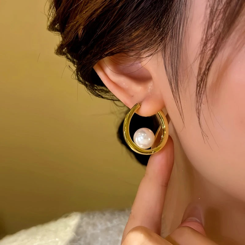 Close-up detail of the sparkling zircons and plating on the Moon Bead Earrings