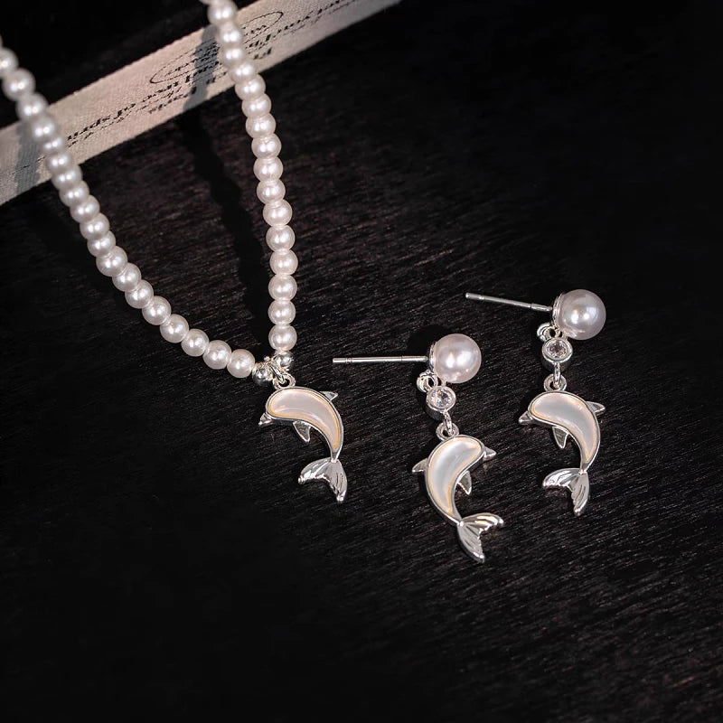 Pearl dolphin pendant necklace and matching dangle earrings set