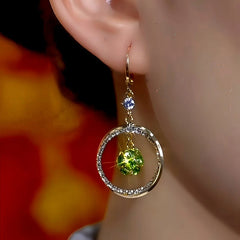 Close-up detail of the sparkling zircons and plating on the Zircon Hoop Earrings