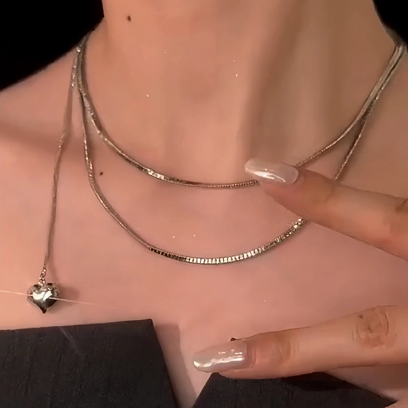 14K Gold-Plated Multi-Layered Heart Necklace worn to showcase its length and pendant detail