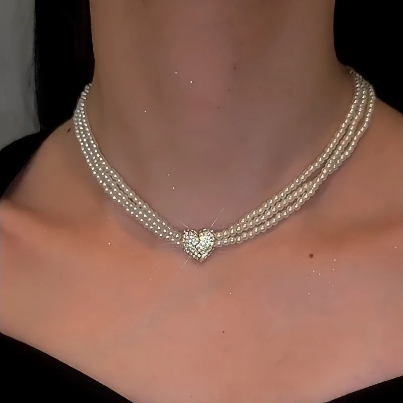 Close-up of the pendant and clasp on the Magnetic Heart Pearl