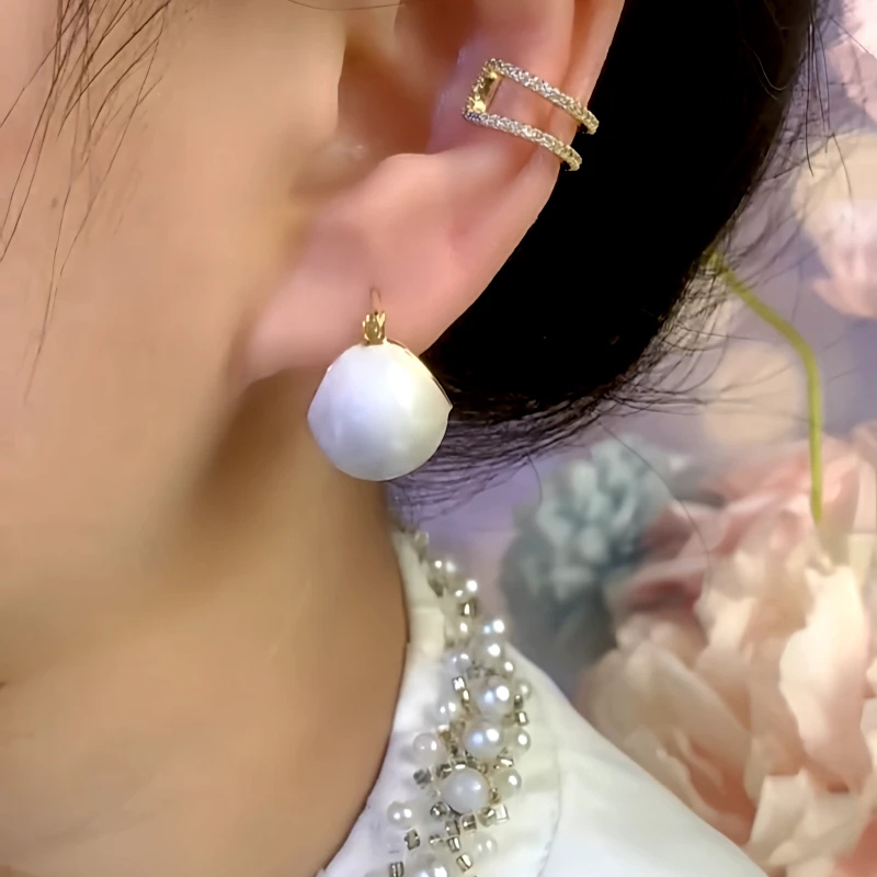 Close-up detail of the sparkling zircons and plating on the Oil Drop Basket