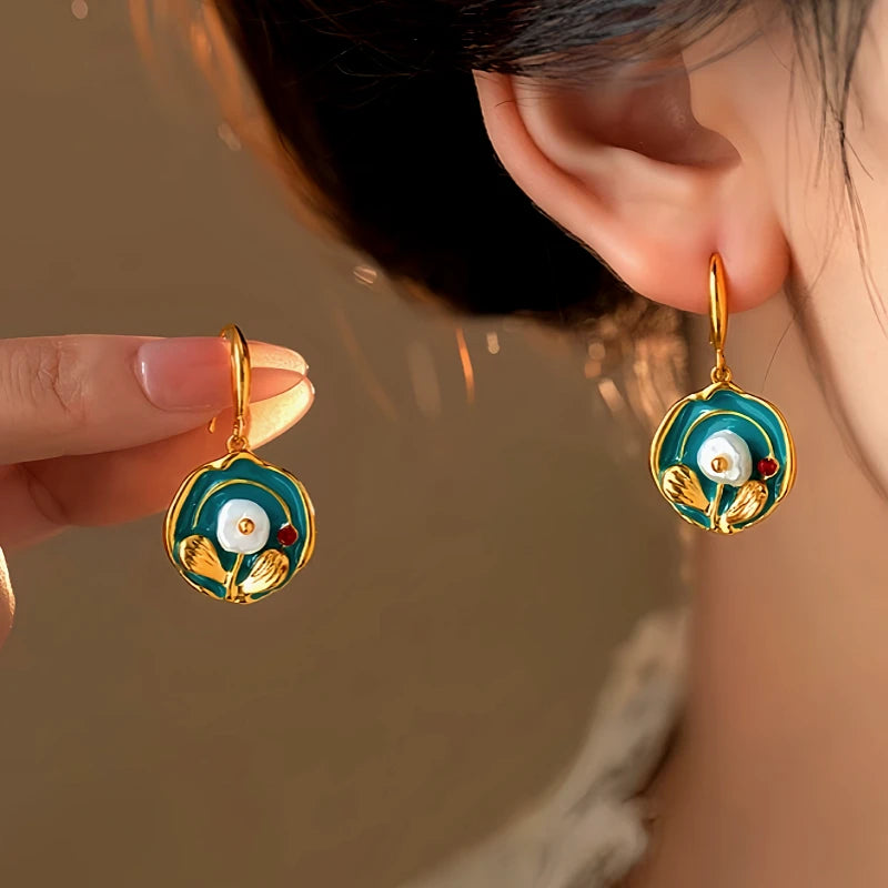 Vintage Gold Teal Enamel Flower Dangle Earrings, Shown on Ear and Held in Hand