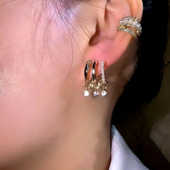 Gold pearl CZ dangle huggie hoop earrings with ear cuff worn on ear