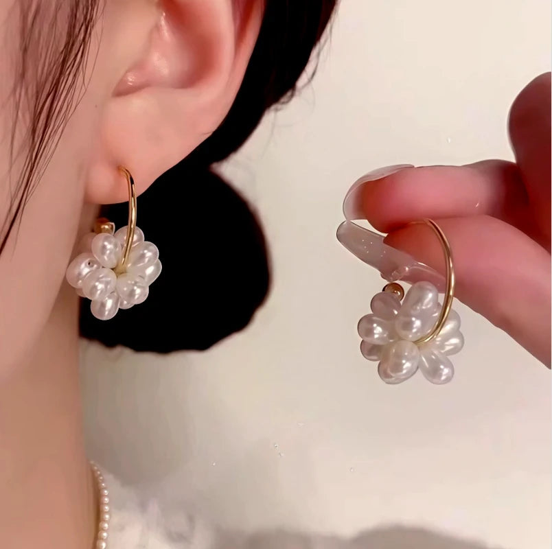 Pearl flower gold hoop earring: worn on ear + held in hand, style demo