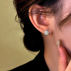 Close-up detail of the sparkling zircons and plating on the Pearl Flower Earrings