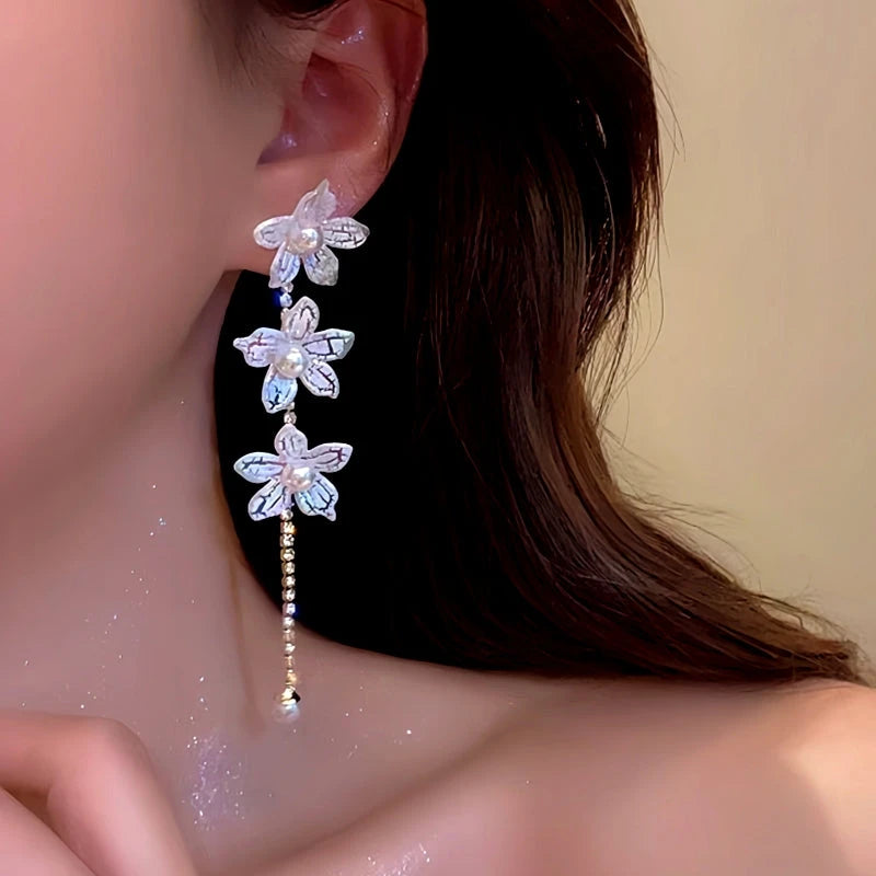 Close-up detail of the sparkling zircons and plating on the Pearl Flower Tassel