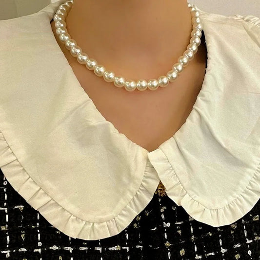 14K Gold-Plated Pearl Necklace worn to showcase its length and pendant detail