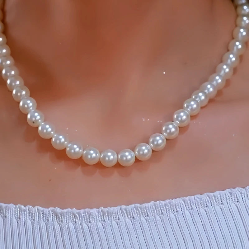 Detailed view of the 14K Gold-Plated Pearl Necklace chain and pendant