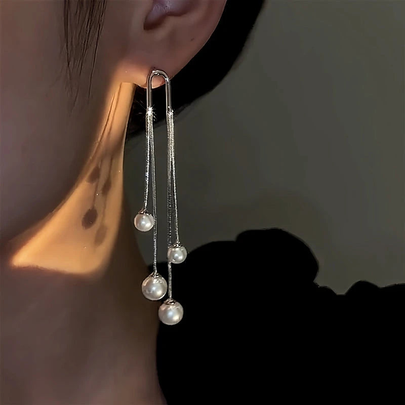 Close-up detail of the sparkling zircons and plating on the Pearl Tassel Earrings