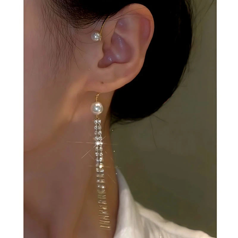 Model showcasing the dangle and style of the 14K Gold-Plated Pearl Zircon Diamond Tassel Ear Cuff ( 1 PCS )