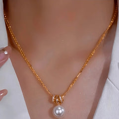 14K Gold-Plated Pendant Bead Earrings worn to showcase its length and pendant detail