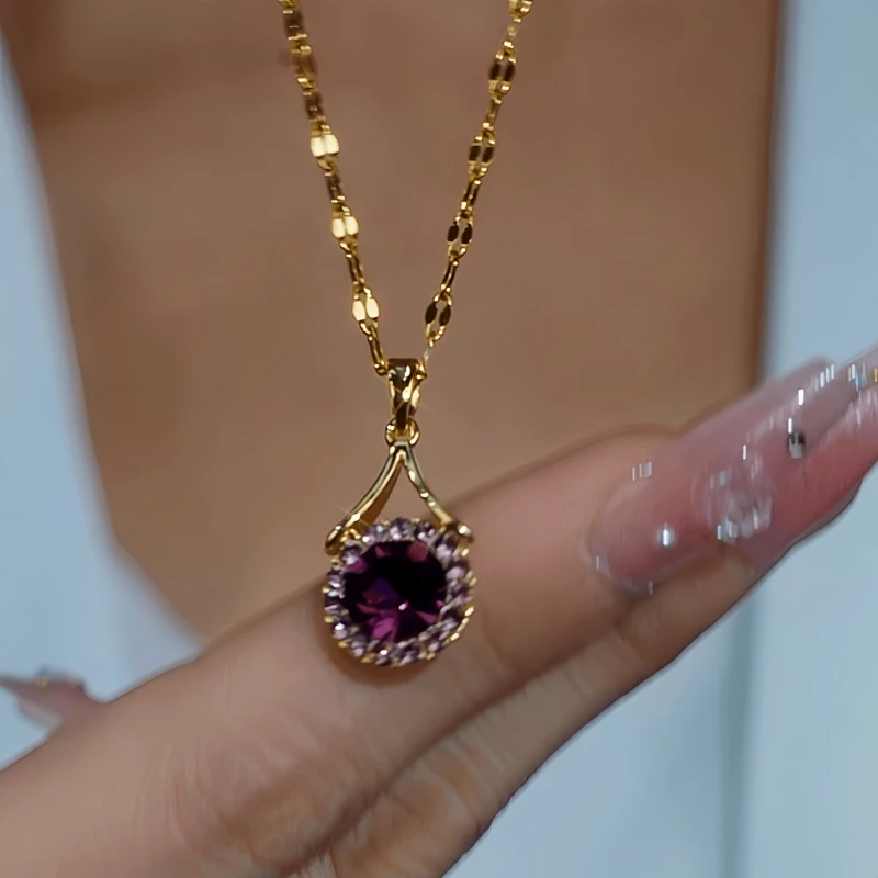 Close-up of the pendant and clasp on the Purple Crystal Necklace