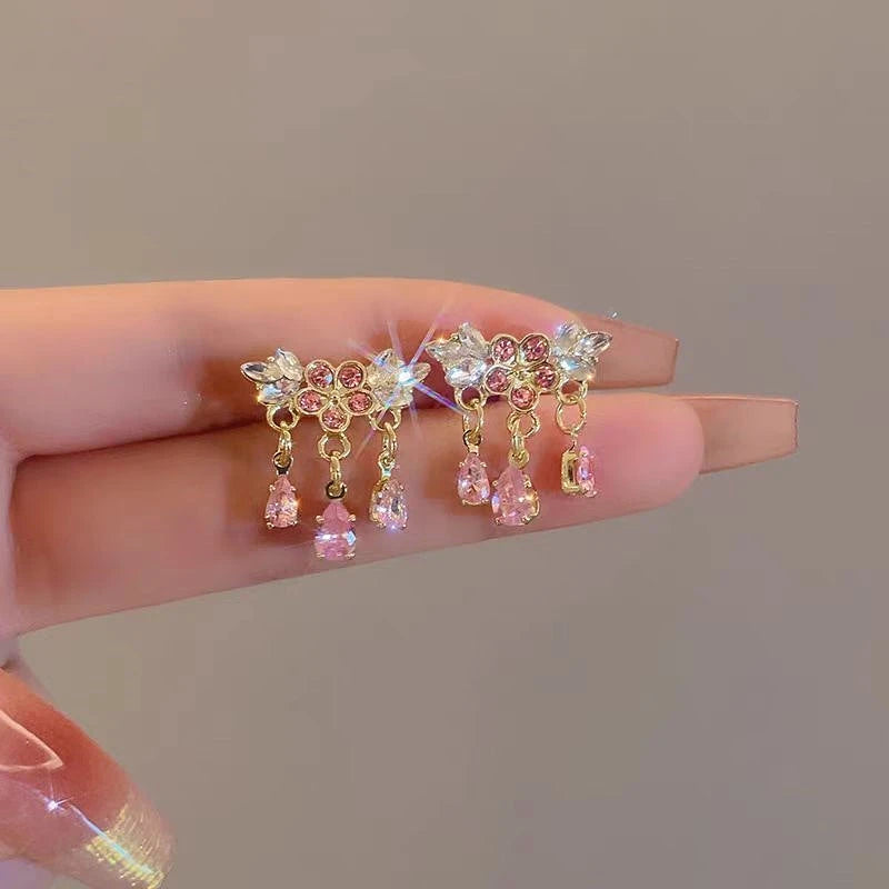 Angled view of the 14K Gold-Plated Pink Diamond Flower Earrings