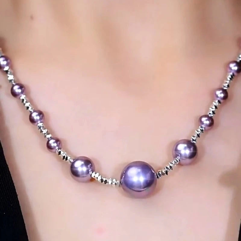 Detailed view of the 14K Gold-Plated Purple Broken Silver Purple Pearl Necklace chain and pendant