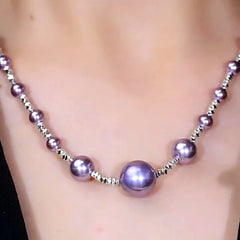 Detailed view of the 14K Gold-Plated Purple Broken Silver Purple Pearl Necklace chain and pendant