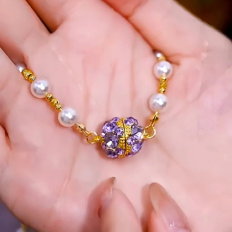 Close-up of the pendant and clasp on the Magnetic Pearl Necklaces