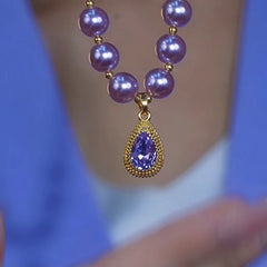 Detailed view of the 14K Gold-Plated Purple Diamond Pearl Water Drop Necklace chain and pendant