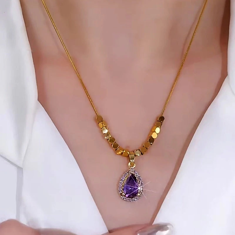 14K Gold-Plated Purple Diamond Water Drop Necklace worn to showcase its length and pendant detail