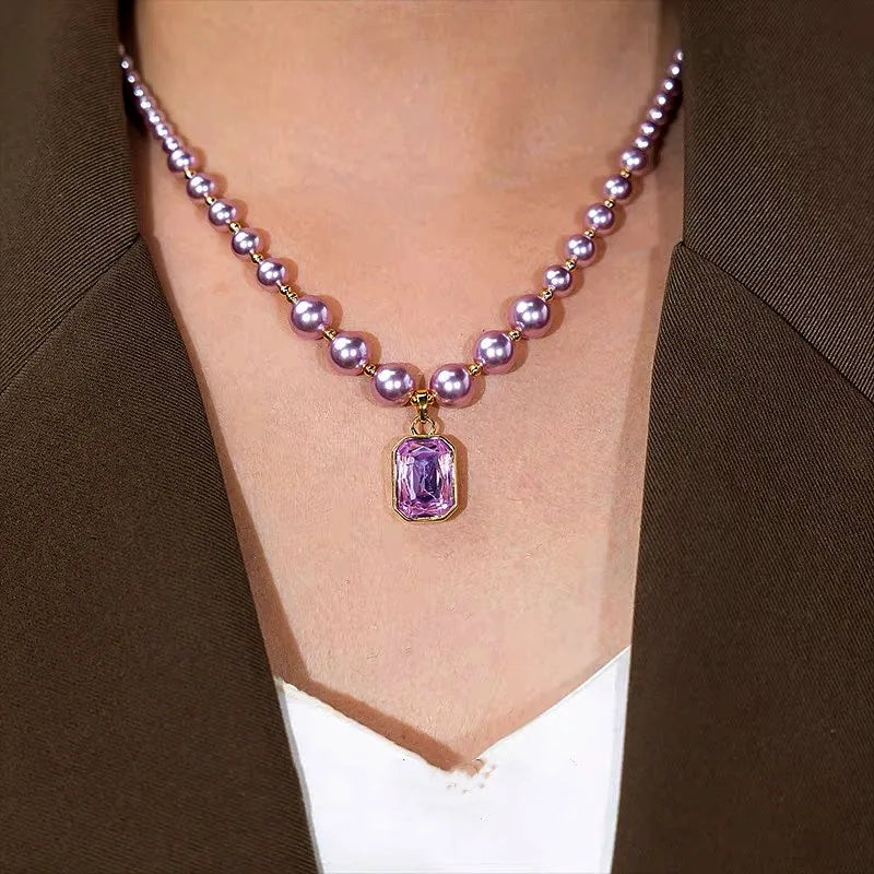 14K Gold-Plated Purple Zircon Diamond Pearl Necklace worn to showcase its length and pendant detail