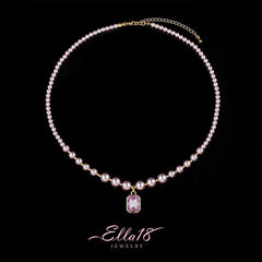Detailed view of the 14K Gold-Plated Purple Zircon Diamond Pearl Necklace chain and pendant