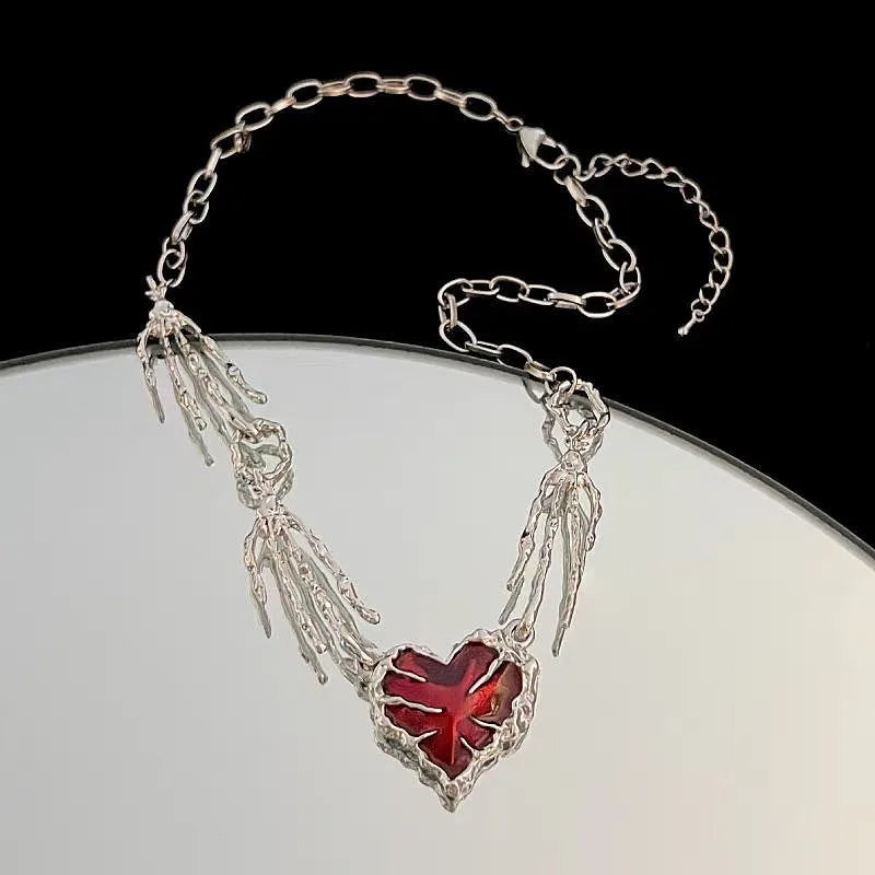 Close-up of the pendant and clasp on the Skeleton Hand Necklace