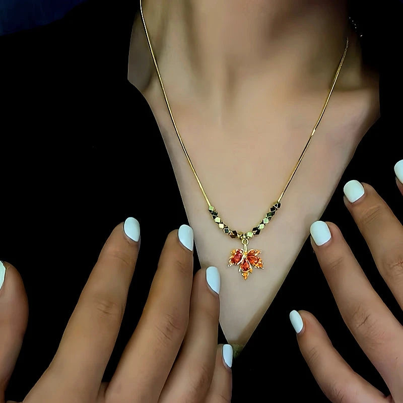 14K Gold-Plated Red Maple Leaf Necklaces worn to showcase its length and pendant detail