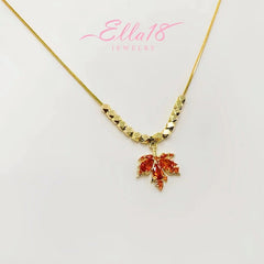 Close-up of the pendant and clasp on the Maple Leaf Necklace