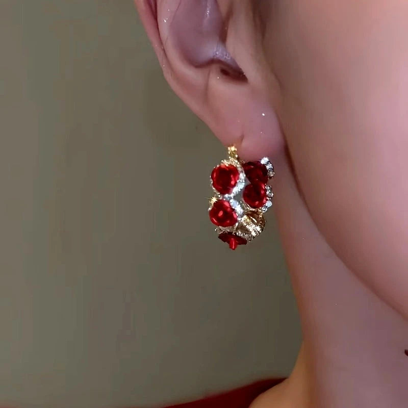 Close-up detail of the sparkling zircons and plating on the Rose Hoop Earrings