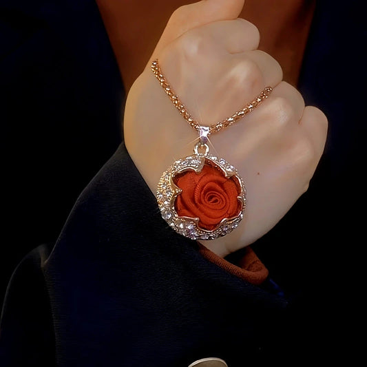 14K Gold-Plated Red Rose Sweater Chain Necklace worn to showcase its length and pendant detail