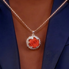 Close-up of the pendant and clasp on the Rose Sweater Necklace