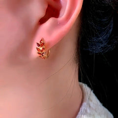 Close-up detail of the sparkling zircons and plating on the Wheat Hoop Earrings