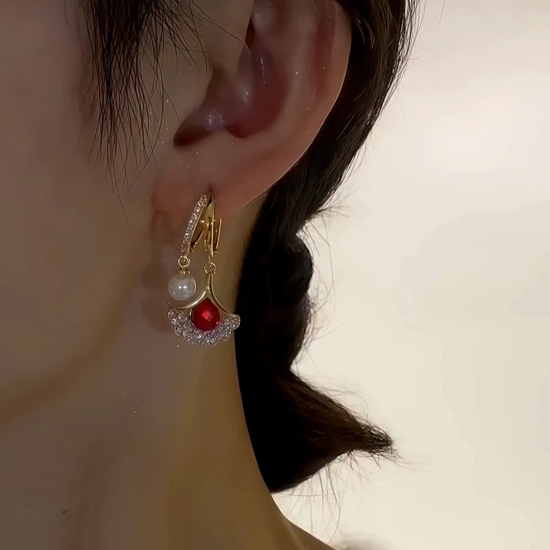 Close-up detail of the sparkling zircons and plating on the Gingko Leaf Earrings