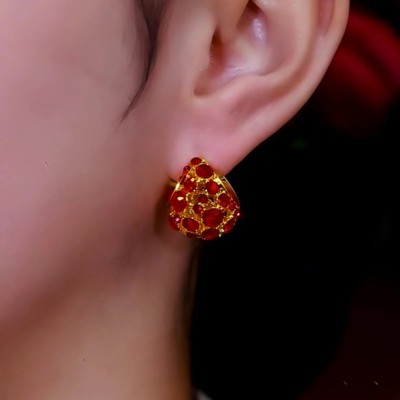 Close-up detail of the sparkling zircons and plating on the Red Teardrop Earrings