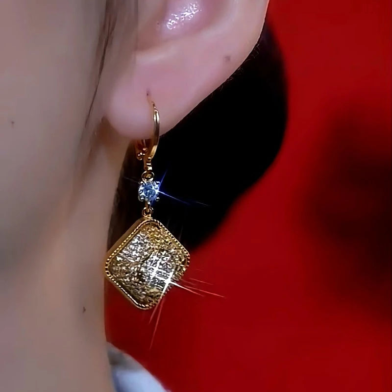 Close-up detail of the sparkling zircons and plating on the Geometric Diamond Earrings