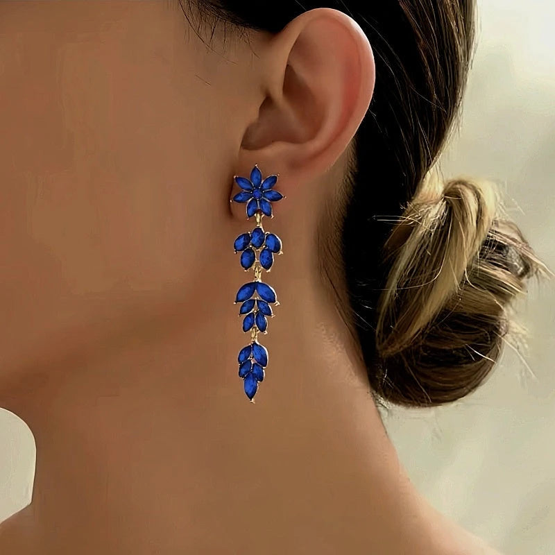 Close-up detail of the sparkling zircons and plating on the Rhinestone Tassel Earrings