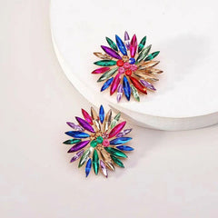Model showcasing the dangle and style of the 14K Gold-Plated Rhinestonen Flower Stud Earrings