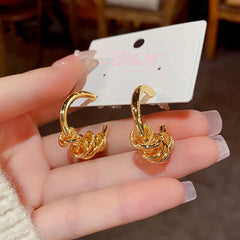 Close-up detail of the sparkling zircons and plating on the Gold Hoop Earrings