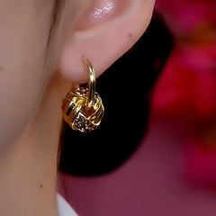 Close-up detail of the sparkling zircons and plating on the Ring Hoop Earrings