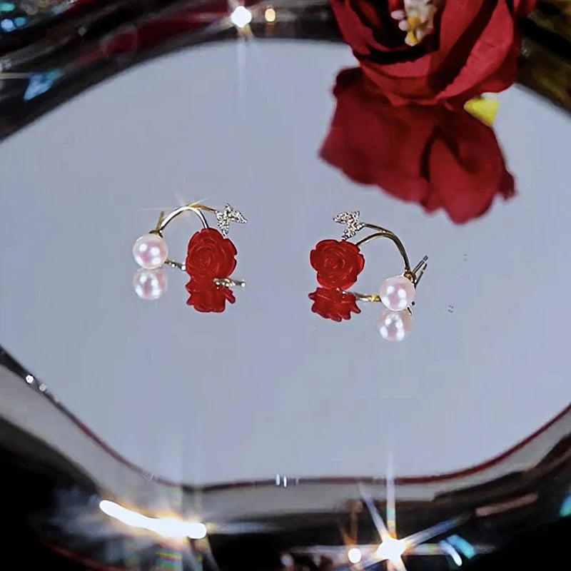 Close-up detail of the sparkling zircons and plating on the Butterfly Pearl Earrings