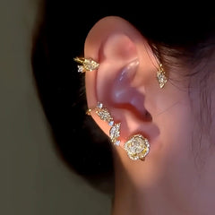 Model showcasing the dangle and style of the 14K Gold-Plated Rose Leaf Ear Cuffs ( 1 pair )